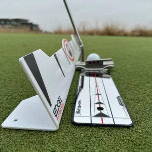 Edge Putting Rail & Quick Look Mirror Combo on the green with a golf club and ball placed for putting practice